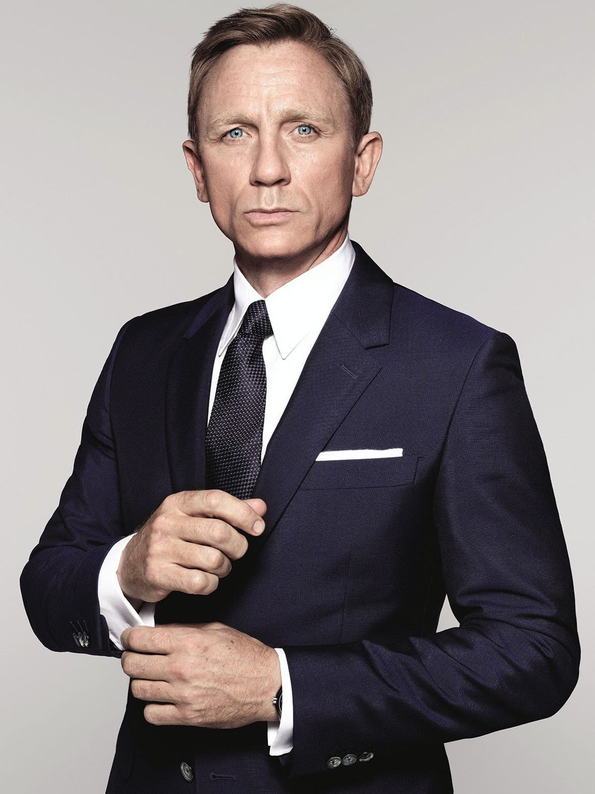 business professional dress code men James Bond suit style - Luxe Digital